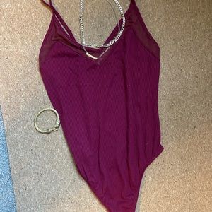 Maroon body suit with mesh detail